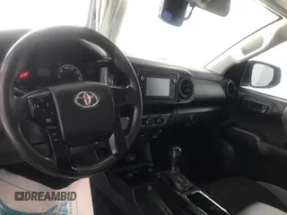 2017 Toyota Tacoma SR z VIN 5TFRX5GN4HX081282, wystawiony jako IAAI lot #42434418 z przebiegiem 184 905 mil mil oraz . Historia ofert i sprzedaży dostępna na DreamBid. Obrazek 11.