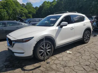 2018 Mazda CX-5 Grand Touring с VIN JM3KFADM3J1351532, выставлен на аукционе Copart как лот 55567405 с пробегом 99 134 миль миль и Списание • Salvage title. История ставок и продаж доступна на DreamBid. Изображение 1.