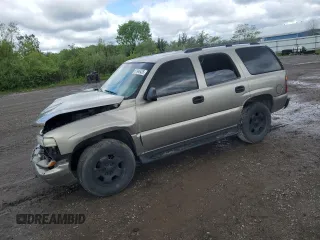 2002 Chevrolet Tahoe LS with VIN 1GNEK13V62J203444, listed as a Copart auction lot 57946425 with 249,035 mi miles and Salvage title. Bid and sale history available at DreamBid. Image 1.