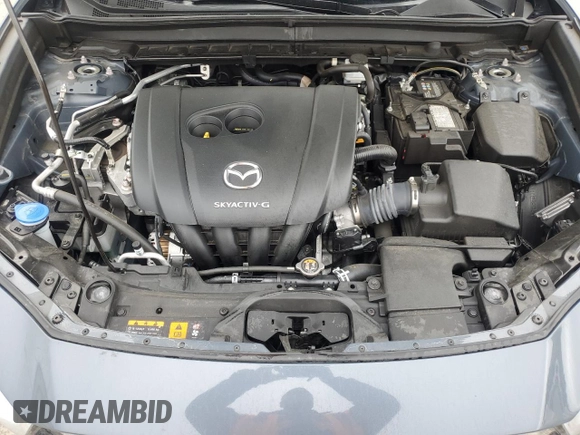 2022 Mazda CX-30 S Carbon Edition z VIN 3MVDMBCLXNM450913, wystawiony jako Copart lot #58537815 z przebiegiem 22 756 mil mil oraz Szkoda całkowita • Salvage title. Historia ofert i sprzedaży dostępna na DreamBid. Obrazek 12.