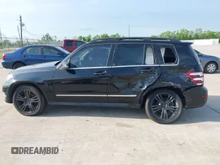 2013 Mercedes-Benz GLK with VIN WDCGG5HB2DF990806, listed as a IAAI auction lot 42047198 with 130,728 mi miles. Bid and sale history available at carsss.com. Image 14.