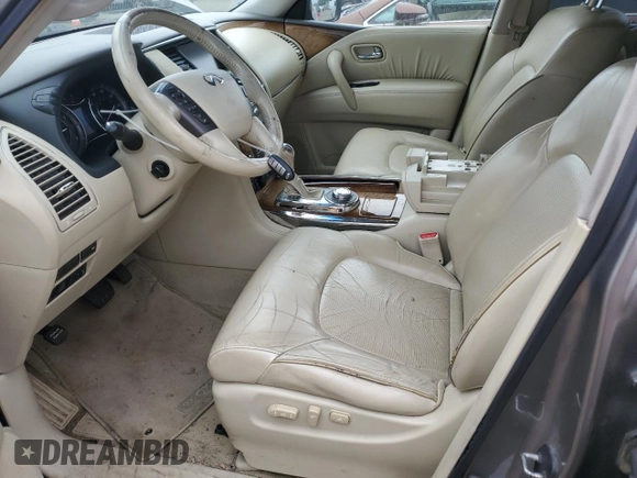 2011 Infiniti QX56 7-passenger with VIN JN8AZ2NE4B9006915, listed as a Copart auction lot 61909295 with 157,700 mi miles and Clean title. Bid and sale history available at DreamBid. Image 7.
