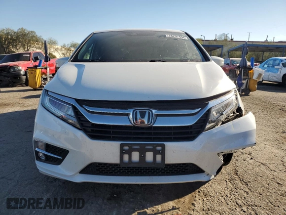 2020 Honda Odyssey Touring with VIN 5FNRL6H8XLB007622, listed as a Copart auction lot 76297494 with 83,452 mi miles and Salvage Title. Bid and sale history available at DreamBid. Image 5.