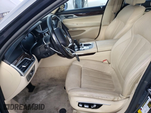 2017 BMW 7 Series 740i xDrive with VIN WBA7E4C5XHGU99064, listed as a Copart auction lot 70792133 with 122,264 mi miles. Bid and sale history available at carsss.com. Image 7.