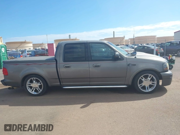 2002 Ford F-150 Harley Davidson with VIN 1FTRW07312KC88379, listed as a IAAI auction lot 41657219 with 1 mi miles. Bid and sale history available at carsss.com. Image 13.