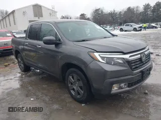 2020 Honda Ridgeline RTL-E with VIN 5FPYK3F70LB015422, listed as a IAAI auction lot 41578369 with 78,860 mi miles and . Bid and sale history available at DreamBid. Image 1.