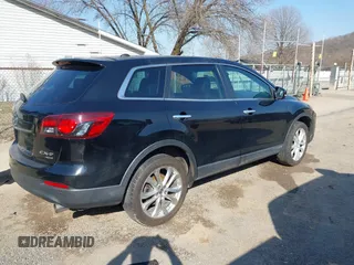 2013 Mazda CX-9 Grand Touring with VIN JM3TB3DA5D0407272, listed as a IAAI auction lot 41760028 with 188,900 mi miles and . Bid and sale history available at carsss.com. Image 4.