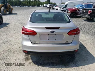 2016 Ford Focus SE with VIN 1FADP3FE8GL353103, listed as a Copart auction lot 64972865 with 131,403 mi miles and Clean title. Bid and sale history available at DreamBid. Image 6.