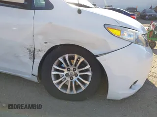 2013 Toyota Sienna XLE AAS with VIN 5TDYK3DC3DS308298, listed as a IAAI auction lot 41292280 with 165,638 mi miles and . Bid and sale history available at DreamBid. Image 6.