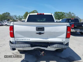2017 Chevrolet Silverado 1500 LT with VIN 3GCUKREC4HG391101, listed as a IAAI auction lot 42129151 with 84,670 mi miles and . Bid and sale history available at DreamBid. Image 16.