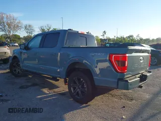2023 Ford F-150 XL with VIN 1FTEW1CP7PKD30770, listed as a IAAI auction lot 41691526 with 3,000 mi miles. Bid and sale history available at carsss.com. Image 3.