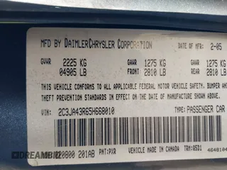 2005 Chrysler 300 with VIN 2C3JA43R65H668010, listed as a IAAI auction lot 41976405 with 216,099 mi miles. Bid and sale history available at carsss.com. Image 9.