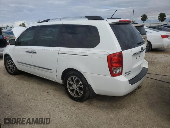 2014 Kia Sedona EX with VIN KNDMH4C70E6568487, listed as a Copart auction lot 74682134 with 69,977 mi miles and Salvage Title. Bid and sale history available at carsss.com. Image 2.