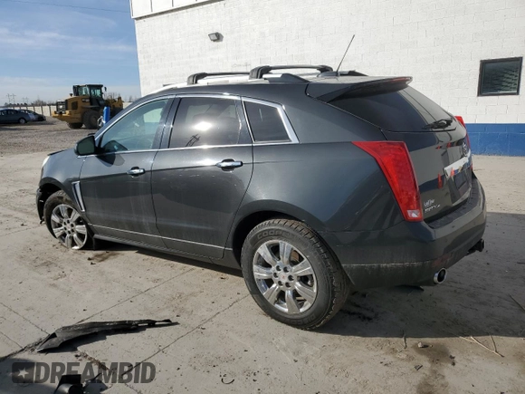 2015 Cadillac SRX Luxury Collection with VIN 3GYFNEE34FS619157, listed as a Copart auction lot 48331665 with 130,477 mi miles and Salvage Title. Bid and sale history available at DreamBid. Image 2.