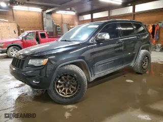 2014 Jeep Grand Cherokee Limited with VIN 1C4RJFBMXEC376797, listed as a Copart auction lot 50589305 with 164,652 mi miles and Salvage Title. Bid and sale history available at carsss.com. Image 1.