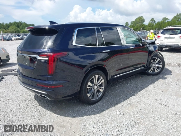 2022 Cadillac XT6 Premium Luxury with VIN 1GYKPCRS4NZ145145, listed as a IAAI auction lot 42533642 with 36,450 mi miles and . Bid and sale history available at DreamBid. Image 4.