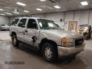 2004 GMC Yukon SLT with VIN 1GKEK13TX4J155865, listed as a IAAI auction lot 41758663 with 281,531 mi miles. Bid and sale history available at carsss.com. Image 1.