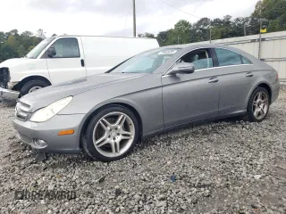 2010 Mercedes-Benz CLS-Class CLS 550 with VIN WDDDJ7CBXAA165625, listed as a Copart auction lot 72983684 with 143,868 mi miles and Salvage Title. Bid and sale history available at carsss.com. Image 1.