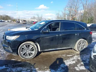 2017 Acura MDX w/Technology Pkg with VIN 5FRYD4H57HB006808, listed as a IAAI auction lot 41350211 with 164,719 mi miles. Bid and sale history available at carsss.com. Image 14.