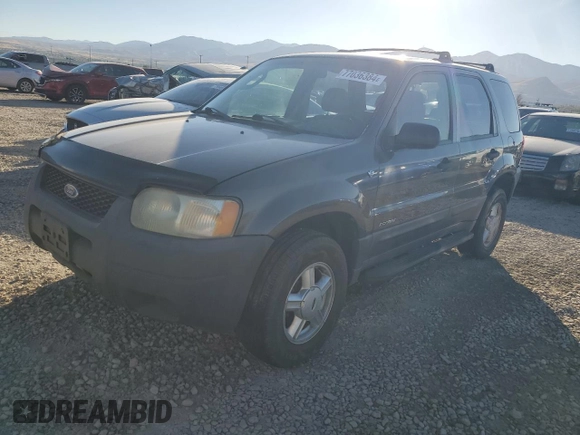 2002 Ford Escape XLS Choice with VIN 1FMYU021X2KC77142, listed as a Copart auction lot 77036384 with 213,292 mi miles and Clean title. Bid and sale history available at DreamBid. Image 1.