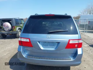 2007 Honda Odyssey EX-L with VIN 5FNRL38727B092077, listed as a IAAI auction lot 41972810 with 211,770 mi miles and . Bid and sale history available at DreamBid. Image 17.