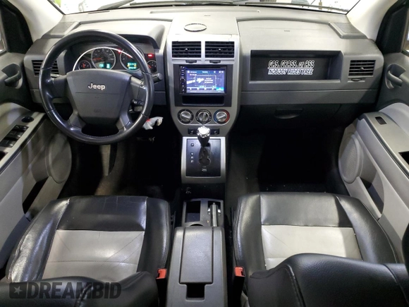 2007 Jeep Compass Limited with VIN 1J8FF57W97D103588, listed as a Copart auction lot 41534315 with 132,296 mi miles and Salvage Title. Bid and sale history available at carsss.com. Image 8.