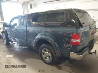 2005 Ford F-150 XLT with VIN 1FTPX14555NA01757, listed as a IAAI auction lot 41935980 with 145,311 mi miles. Bid and sale history available at carsss.com. Image 3.
