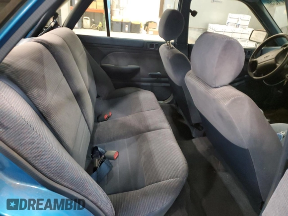 1994 Ford Escort z VIN 1FARP14J9RW318226, wystawiony jako Copart lot #60507135 z przebiegiem 69 041 mil mil oraz Szkoda całkowita • Salvage title. Historia ofert i sprzedaży dostępna na DreamBid. Obrazek 10.