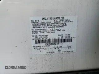 2019 Ford Taurus SEL with VIN 1FAHP2E82KG100142, listed as a Copart auction lot 88655505 with 106,959 mi miles and Salvage Title. Bid and sale history available at DreamBid. Image 14.