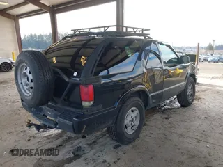 1999 Chevrolet Blazer LS with VIN 1GNCT18W3XK216840, listed as a IAAI auction lot 41534524 with 199,982 mi miles and . Bid and sale history available at DreamBid. Image 4.
