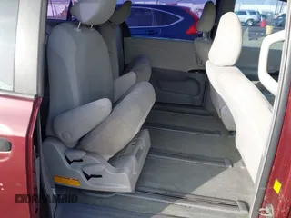 2011 Toyota Sienna with VIN 5TDZK3DCXBS157316, listed as a IAAI auction lot 41240896 with 117,437 mi miles. Bid and sale history available at carsss.com. Image 8.