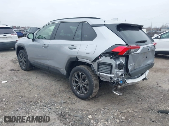 2024 Toyota RAV4 Hybrid XLE Premium with VIN JTMB6RFV0RD140022, listed as a IAAI auction lot 41779613 with 923 mi miles. Bid and sale history available at carsss.com. Image 3.