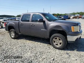 2010 GMC Sierra 1500 SLT with VIN 3GTRKWE38AG160082, listed as a Copart auction lot 52681465 with 251,363 mi miles and Salvage title. Bid and sale history available at DreamBid. Image 4.