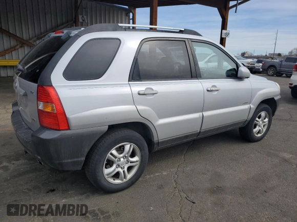 2005 Kia Sportage LX with VIN KNDJE723457117231, listed as a Copart auction lot 50163165 with 97,273 mi miles and Salvage Title. Bid and sale history available at carsss.com. Image 3.