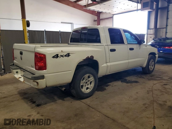 2007 Dodge Dakota SLT with VIN 1D7HW48K97S141569, listed as a Copart auction lot 84002054 with 204,019 mi miles and Salvage Title. Bid and sale history available at carsss.com. Image 3.