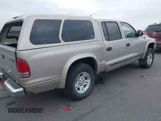 2002 Dodge Dakota SLT z VIN 1B7HG48N32S663205, wystawiony jako IAAI lot #41125874 z przebiegiem 186 761 mil mil oraz . Historia ofert i sprzedaży dostępna na DreamBid. Obrazek 4.