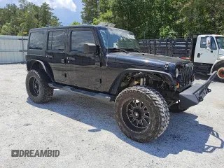 2013 Jeep Wrangler Unlimited Sport z VIN 1C4BJWDG3DL658674, wystawiony jako Copart lot #54851685 z przebiegiem 113 852 mil mil oraz Czysty tytuł • Clean title. Historia ofert i sprzedaży dostępna na DreamBid. Obrazek 4.