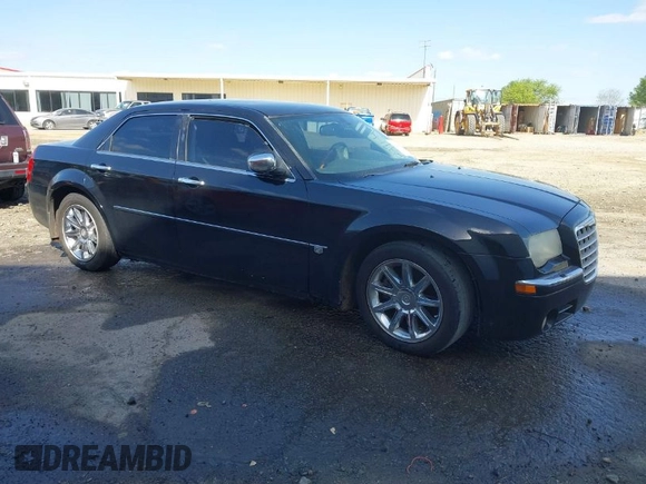 2005 Chrysler 300 with VIN 2C3AA63H65H145122, listed as a IAAI auction lot 41847043 with 237,757 mi miles. Bid and sale history available at carsss.com. Image 1.