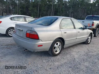 1997 Honda Accord Special Edition with VIN 1HGCD560XVA267719, listed as a IAAI auction lot 41680625 with 325,852 mi miles and . Bid and sale history available at carsss.com. Image 4.