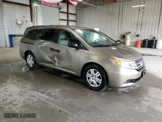 2013 Honda Odyssey LX with VIN 5FNRL5H27DB076212, listed as a Copart auction lot 52856615 with 123,096 mi miles and Salvage Title. Bid and sale history available at carsss.com. Image 4.