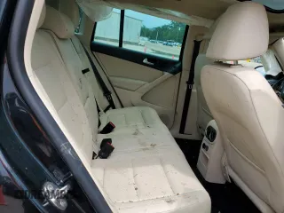 2013 Volkswagen Tiguan SE z VIN WVGAV7AXXDW523728, wystawiony jako Copart lot #64116173 z przebiegiem 116 336 mil mil oraz Szkoda całkowita • Salvage title. Historia ofert i sprzedaży dostępna na DreamBid. Obrazek 12.