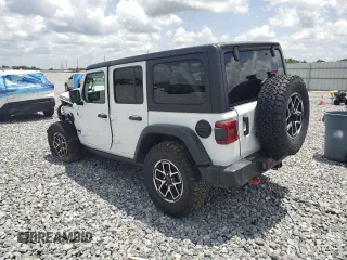 2024 Jeep Wrangler Rubicon z VIN 1C4PJXFG9RW336006, wystawiony jako Copart lot #60237785 z przebiegiem 24 571 mil mil oraz Czysty tytuł • Clean title. Historia ofert i sprzedaży dostępna na DreamBid. Obrazek 2.