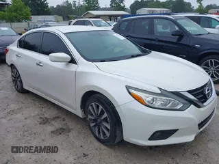 2017 Nissan Altima SV with VIN 1N4AL3AP5HC284685, listed as a IAAI auction lot 42423256 with 123,556 mi miles and . Bid and sale history available at DreamBid. Image 1.