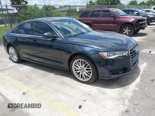 2016 Audi A6 Premium z VIN WAUCFAFC0GN042052, wystawiony jako IAAI lot #42490198 z przebiegiem 142 683 mil mil oraz . Historia ofert i sprzedaży dostępna na DreamBid. Obrazek 1.
