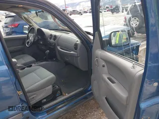 2005 Jeep Liberty Sport with VIN 1J4GL48K45W599048, listed as a IAAI auction lot 41603457 with 107,781 mi miles. Bid and sale history available at carsss.com. Image 5.