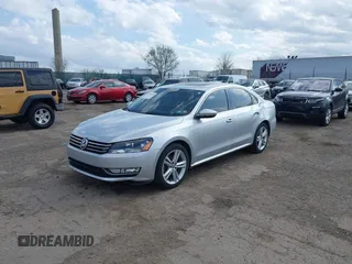 2012 Volkswagen Passat SE w/Sunroof with VIN 1VWBM7A32CC100678, listed as a IAAI auction lot 41925484 with 154,373 mi miles. Bid and sale history available at carsss.com. Image 2.