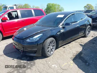 2020 Tesla Model 3 Long Range z VIN 5YJ3E1EB3LF622290, wystawiony jako IAAI lot #41978398 z przebiegiem 59 127 mil mil oraz . Historia ofert i sprzedaży dostępna na DreamBid. Obrazek 2.