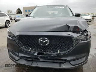2019 Mazda CX-5 Grand Touring with VIN JM3KFBDM2K0650314, listed as a Copart auction lot 51606755 with 88,630 mi miles and Salvage Title. Bid and sale history available at carsss.com. Image 5.