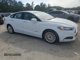 2016 Ford Fusion SE Hybrid with VIN 3FA6P0LU2GR130608, listed as a Copart auction lot 56394795 with 103,617 mi miles and Clean title. Bid and sale history available at DreamBid. Image 4.
