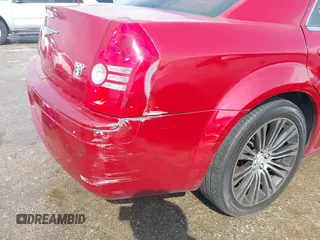 2010 Chrysler 300 with VIN 2C3CA2CV3AH279913, listed as a IAAI auction lot 40731536 with 143,969 mi miles. Bid and sale history available at carsss.com. Image 12.
